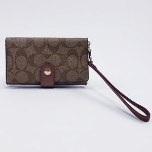 Signature Coach Wristlet wallet